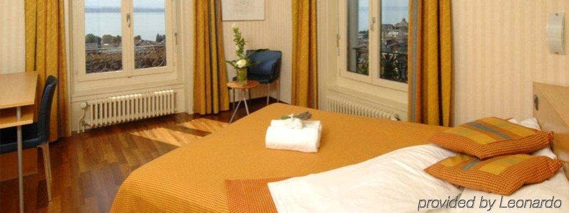 Hotel Alpes & Lac Neuchâtel Δωμάτιο φωτογραφία